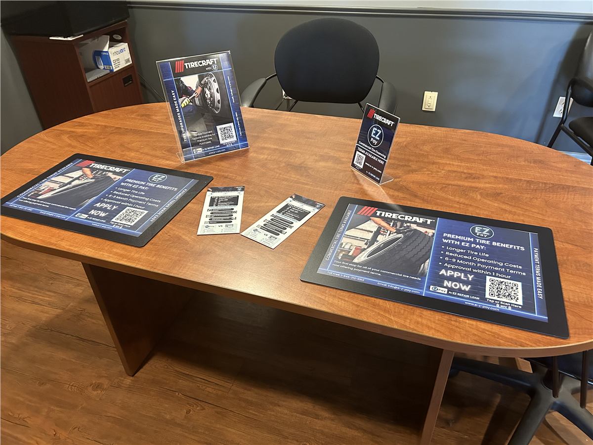 Tirecraft financing materials on a table